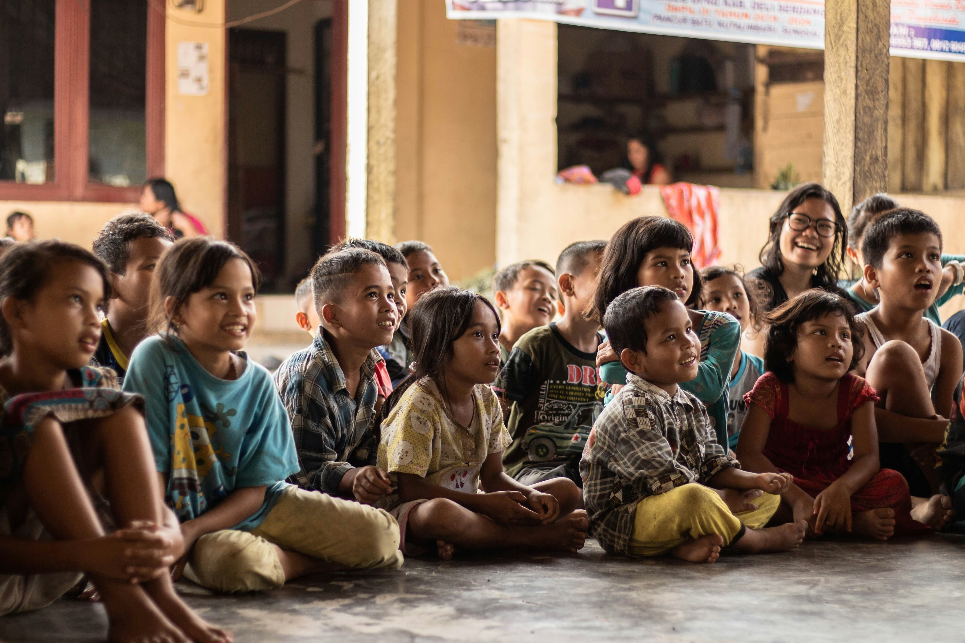 Students gathered outside a community school