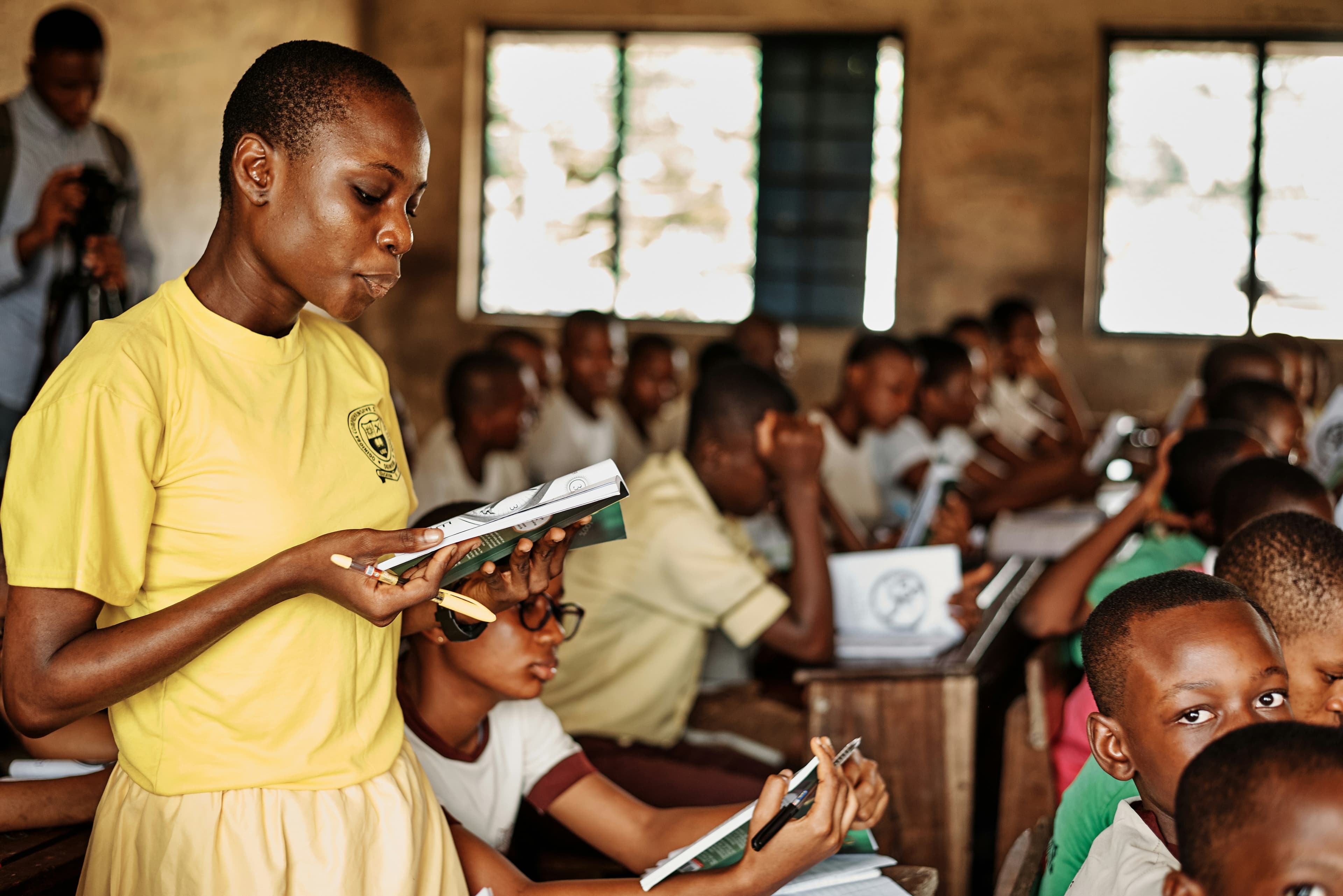A scholar reading at a community library